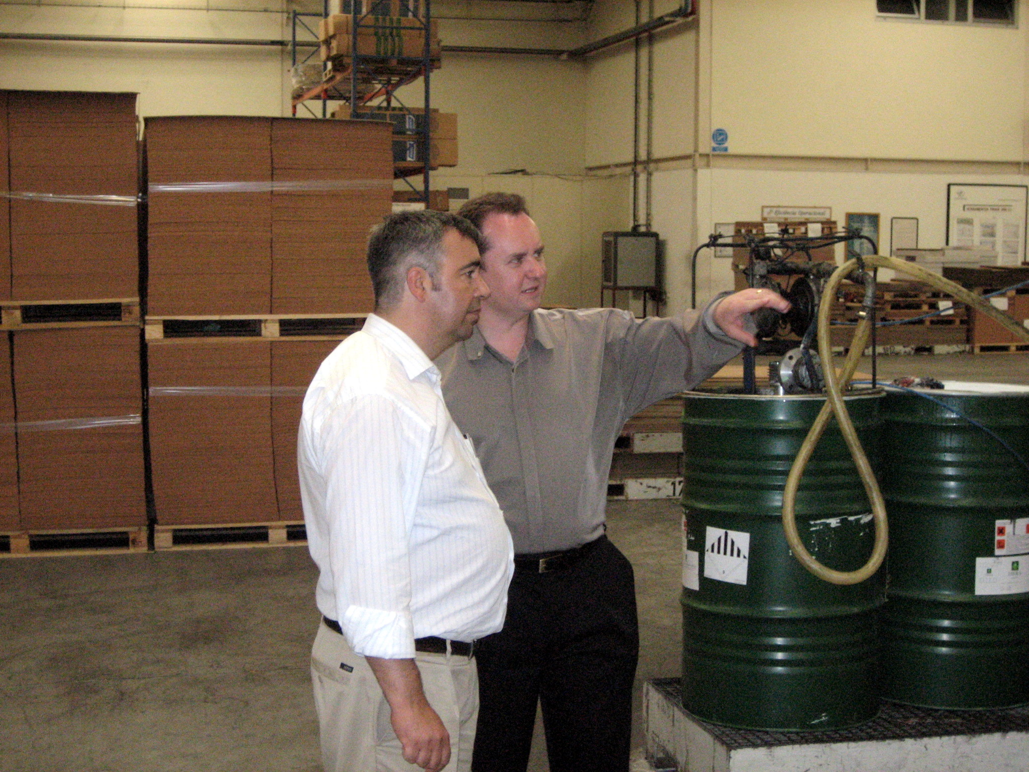 Reviewing production equipment and processes during a factory audit
