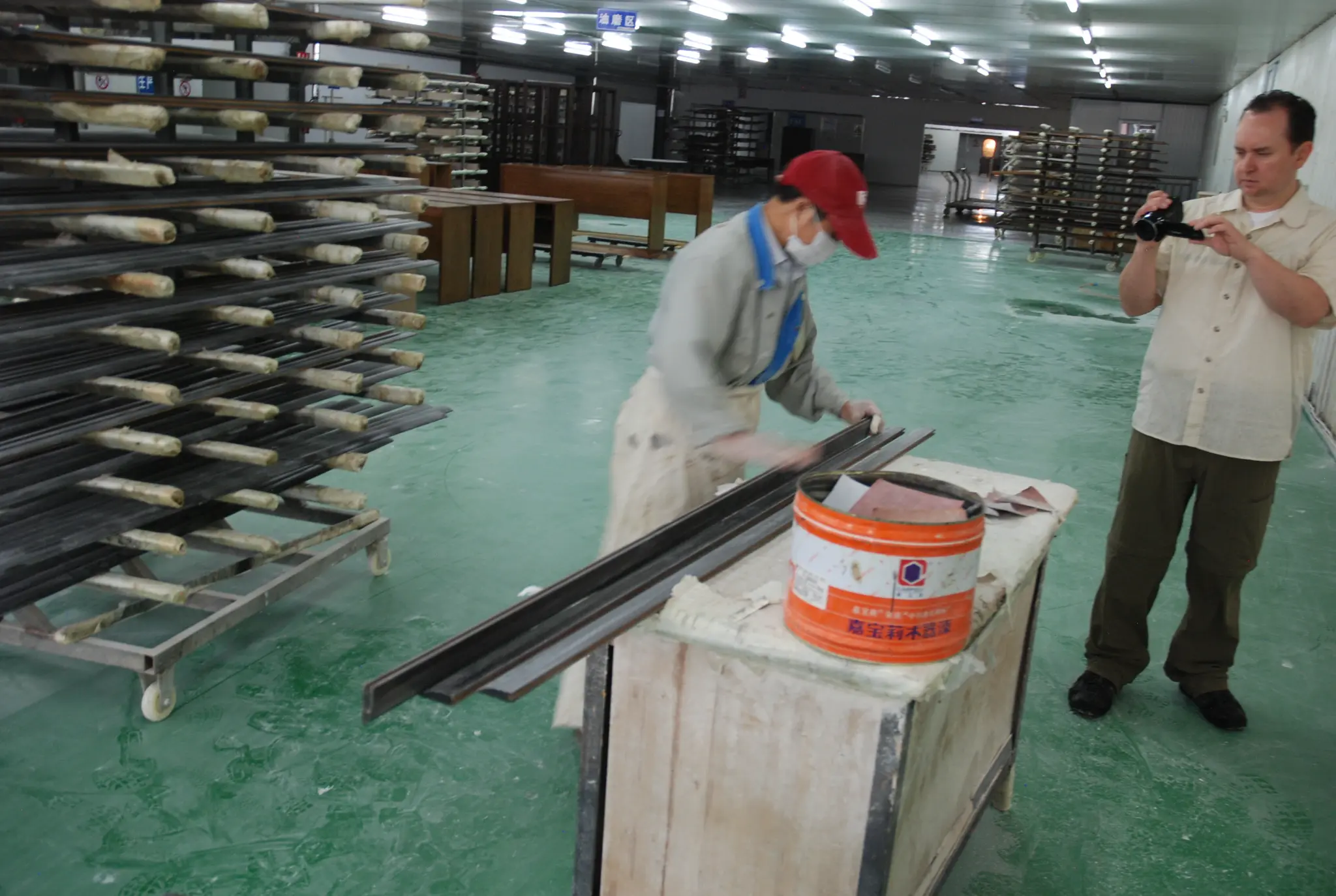 Steve observing finishing processes at a Chinese manufacturing facility